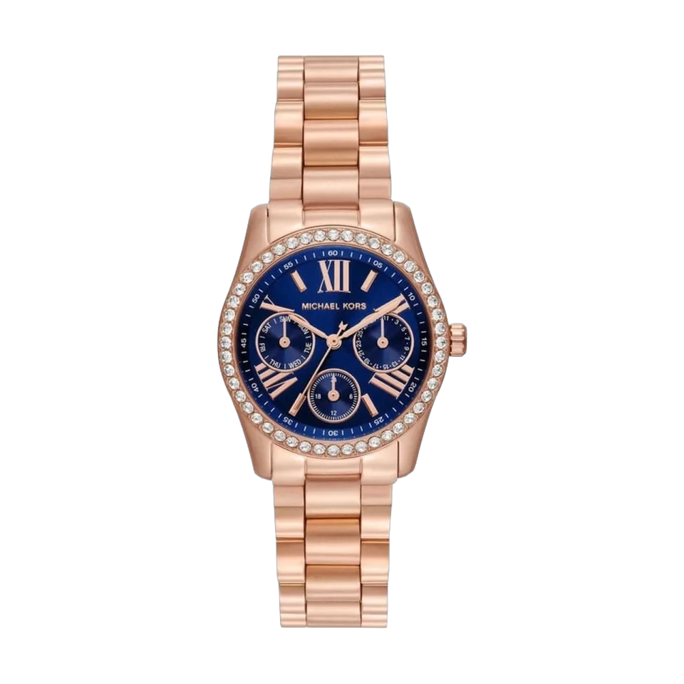 Michael Kors Lexington Lux Multifunction women’s watch with blue dial and rose gold stainless steel bracelet.